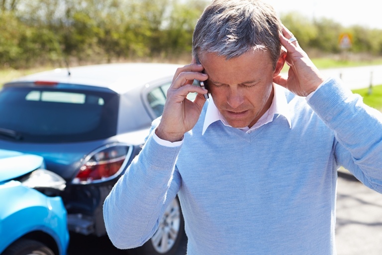 man calling after accident