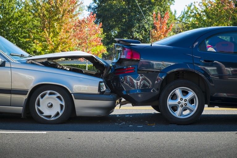 Two Killed in Police Cruiser Collision